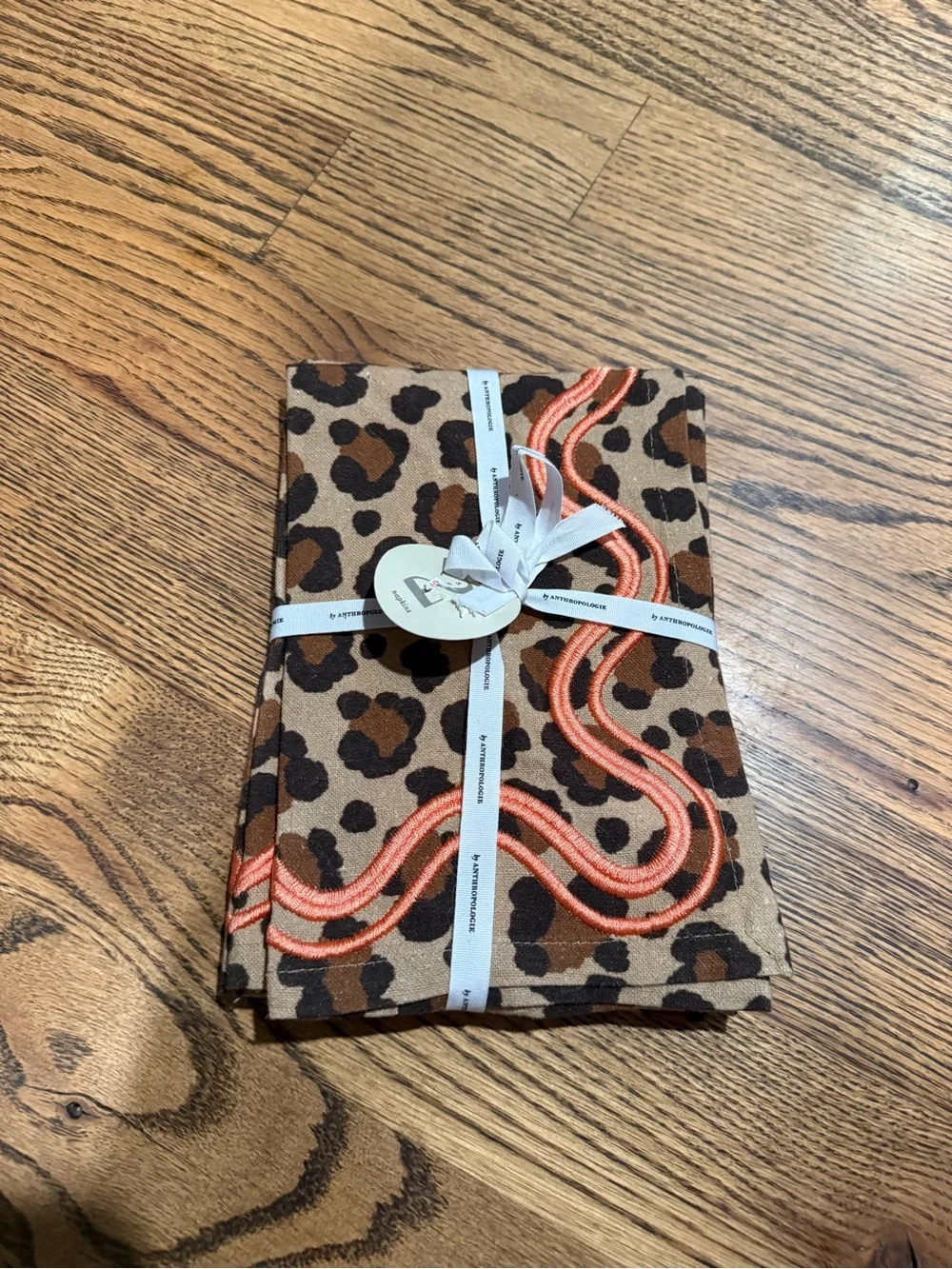 Anthropologie NWT Cheetah / Leopard Print Napkins with Coral Trim - set of 2